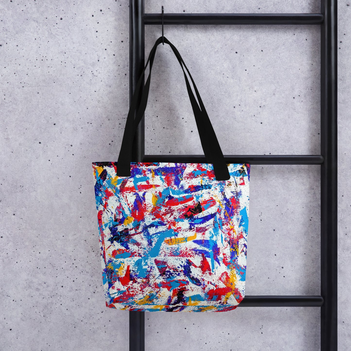 abstract art printed on a canvas tote bag, shown hanging from a step ladder with grey backdrop for a modern, artistic look