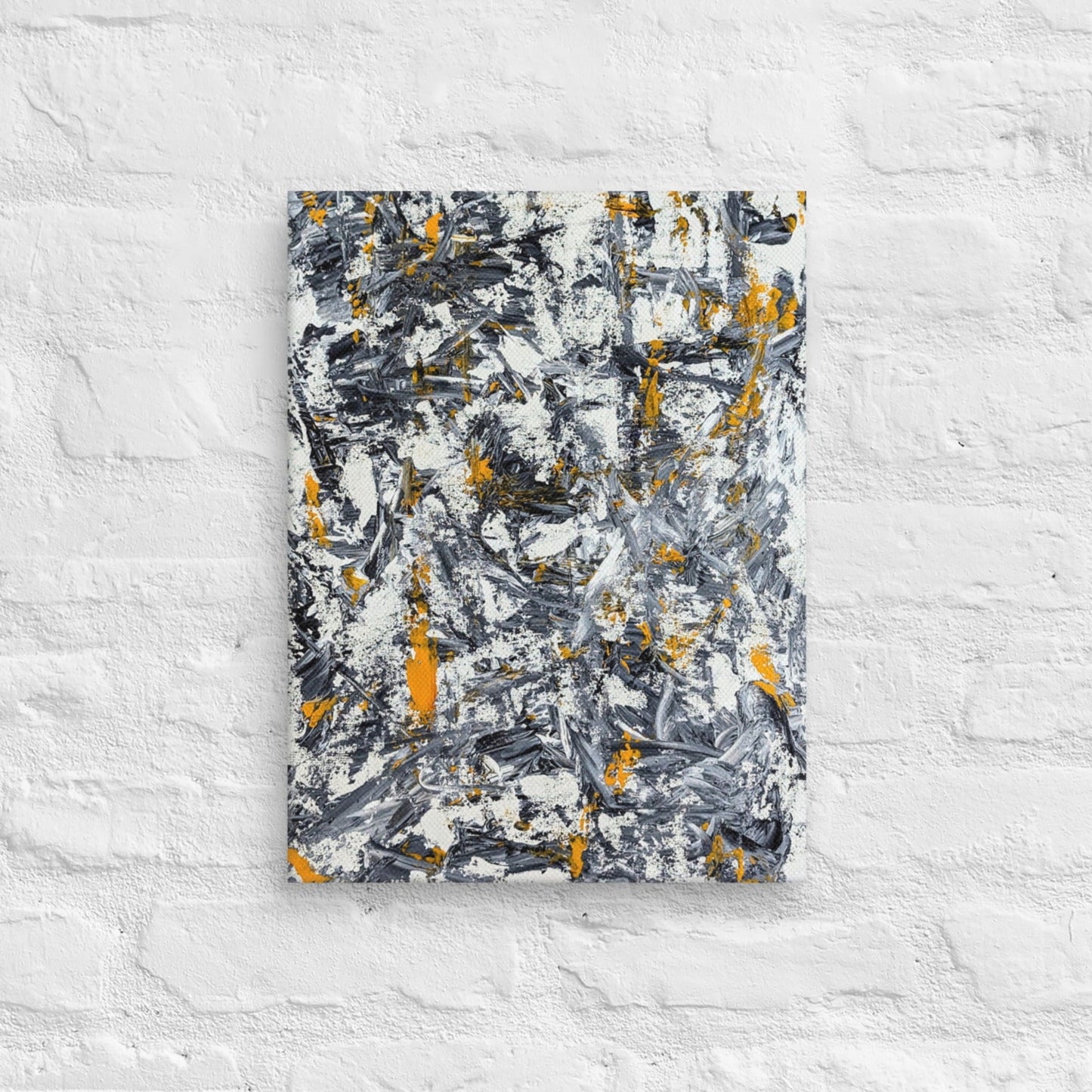 Abstract painting with black, yellow, and white on a textured white wall