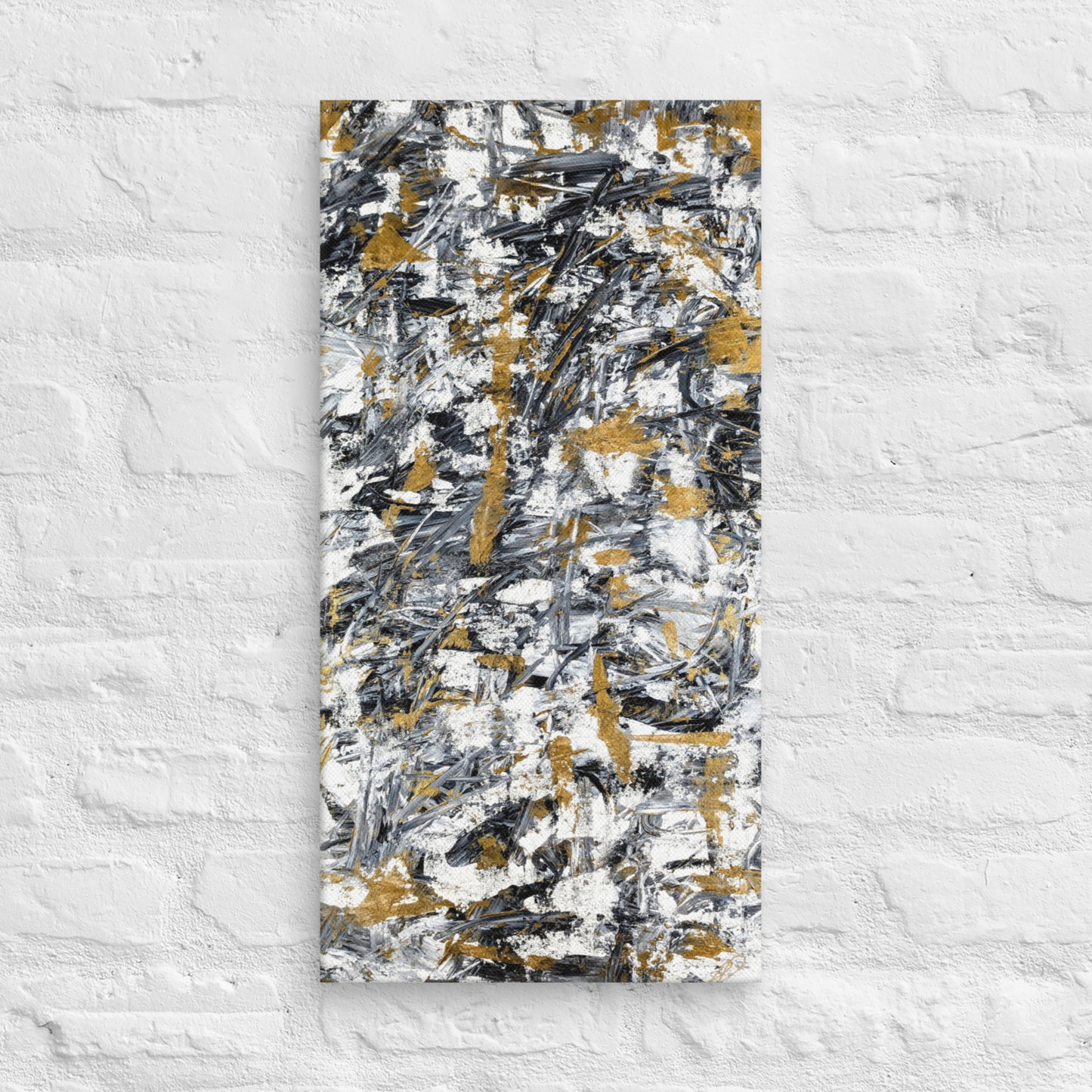 Abstract painting with black, gold, and white on a textured white wall