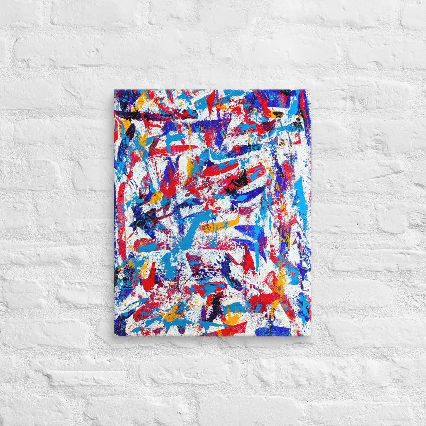 colorful canvas art print mounted on a white brick textured wall, adding vibrant energy to a minimalist interior space