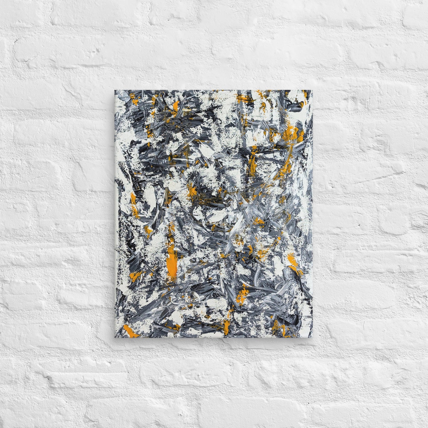 Abstract painting with black, yellow, and white on a textured white wall