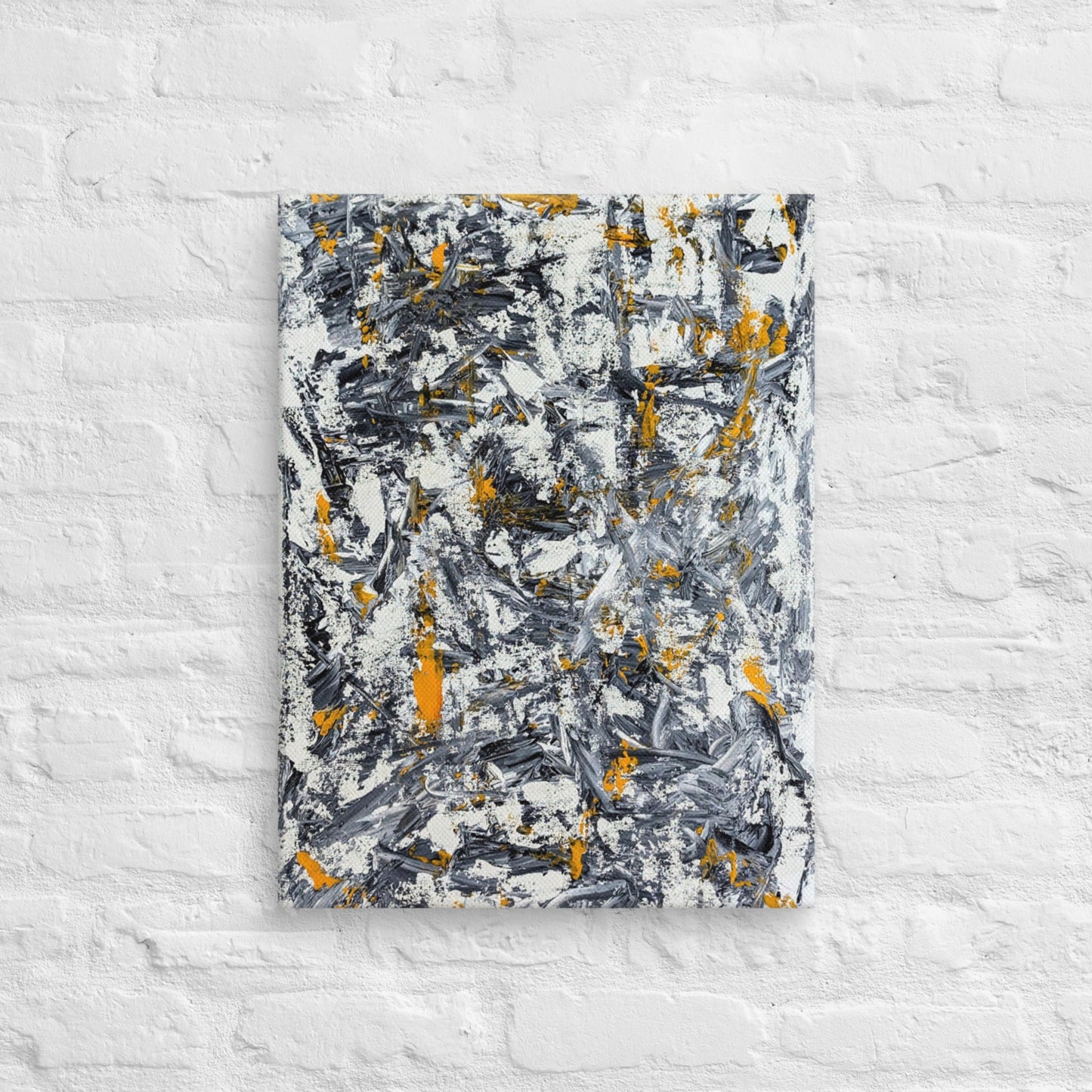 Abstract painting with black, yellow, and white on a textured white wall