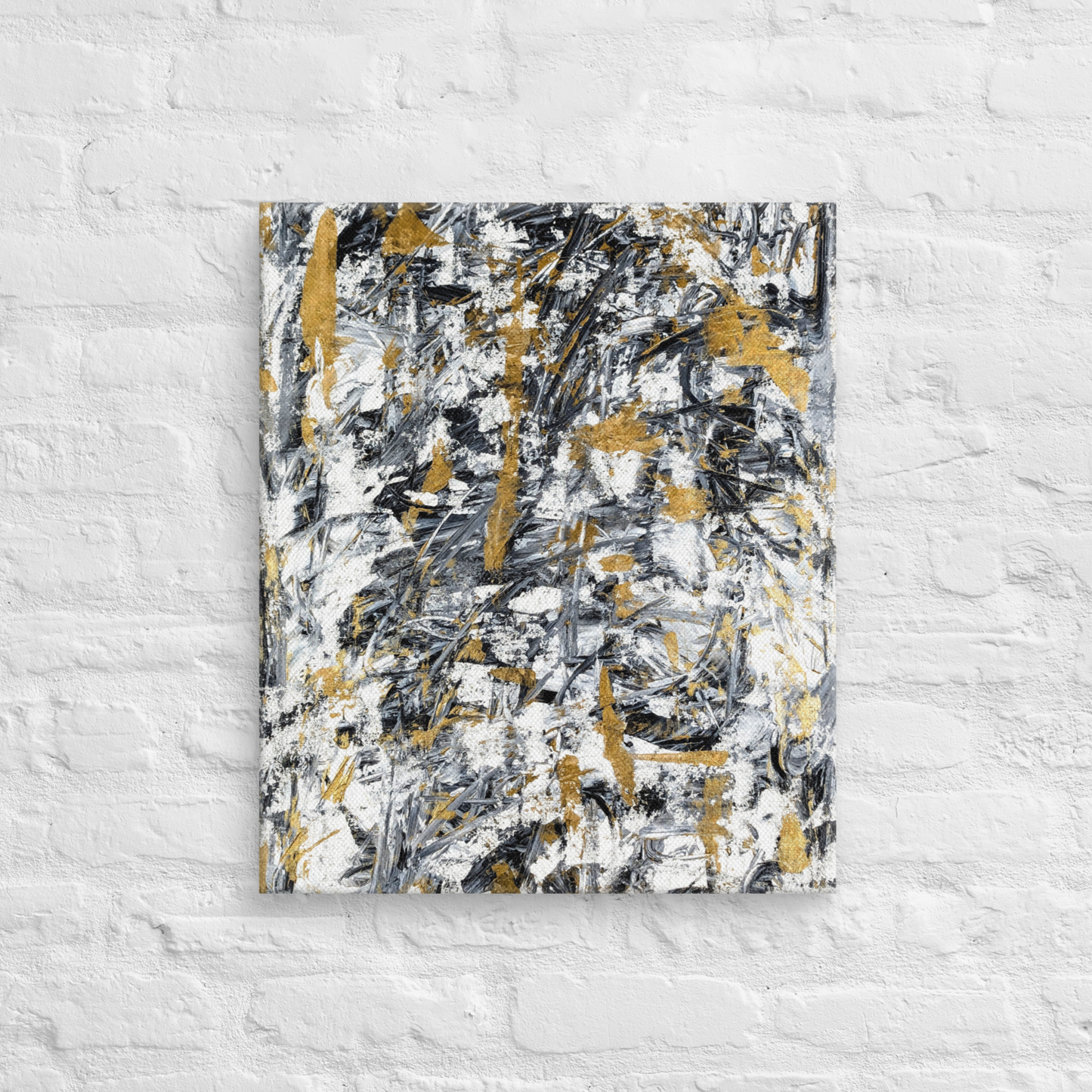 Abstract painting with black, gold, and white on a textured white wall