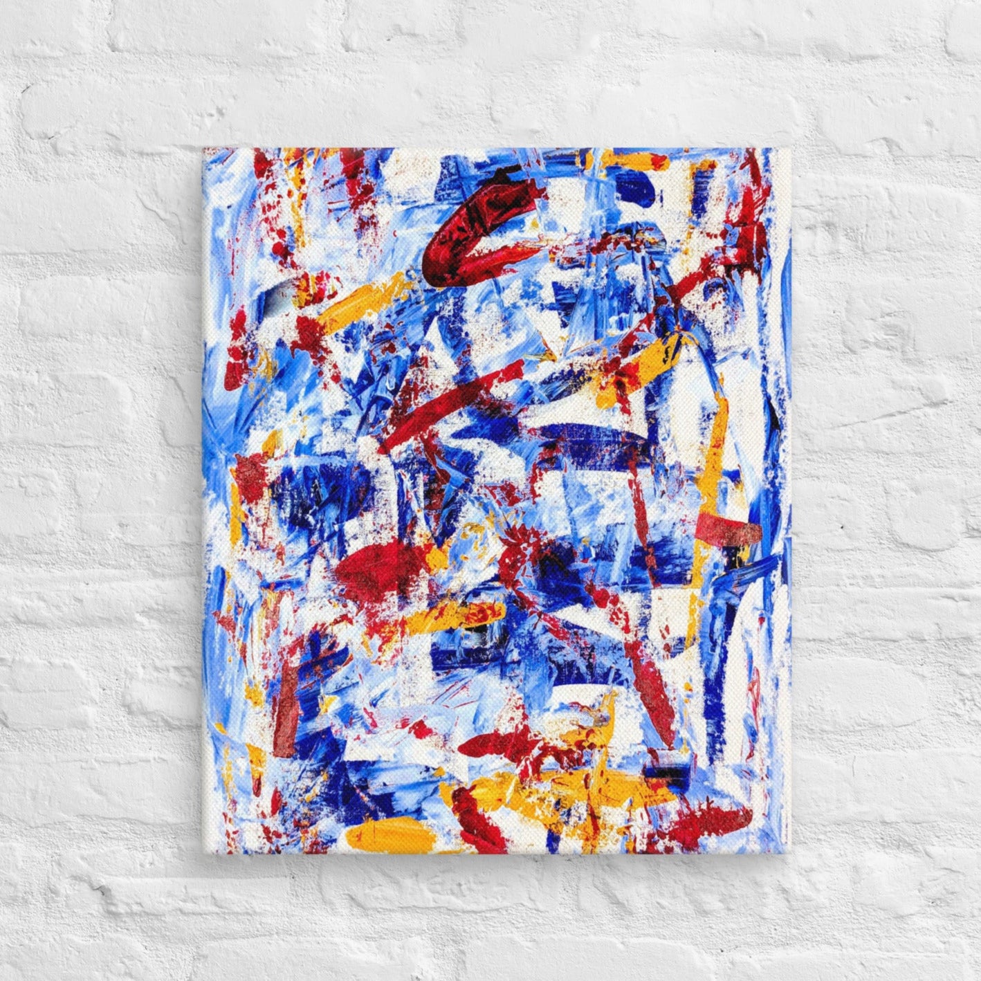 Abstract painting titled "Rebel Parade" featuring bold red strokes layered over cool blues, whites, and yellows, printed on a gallery-wrapped canvas