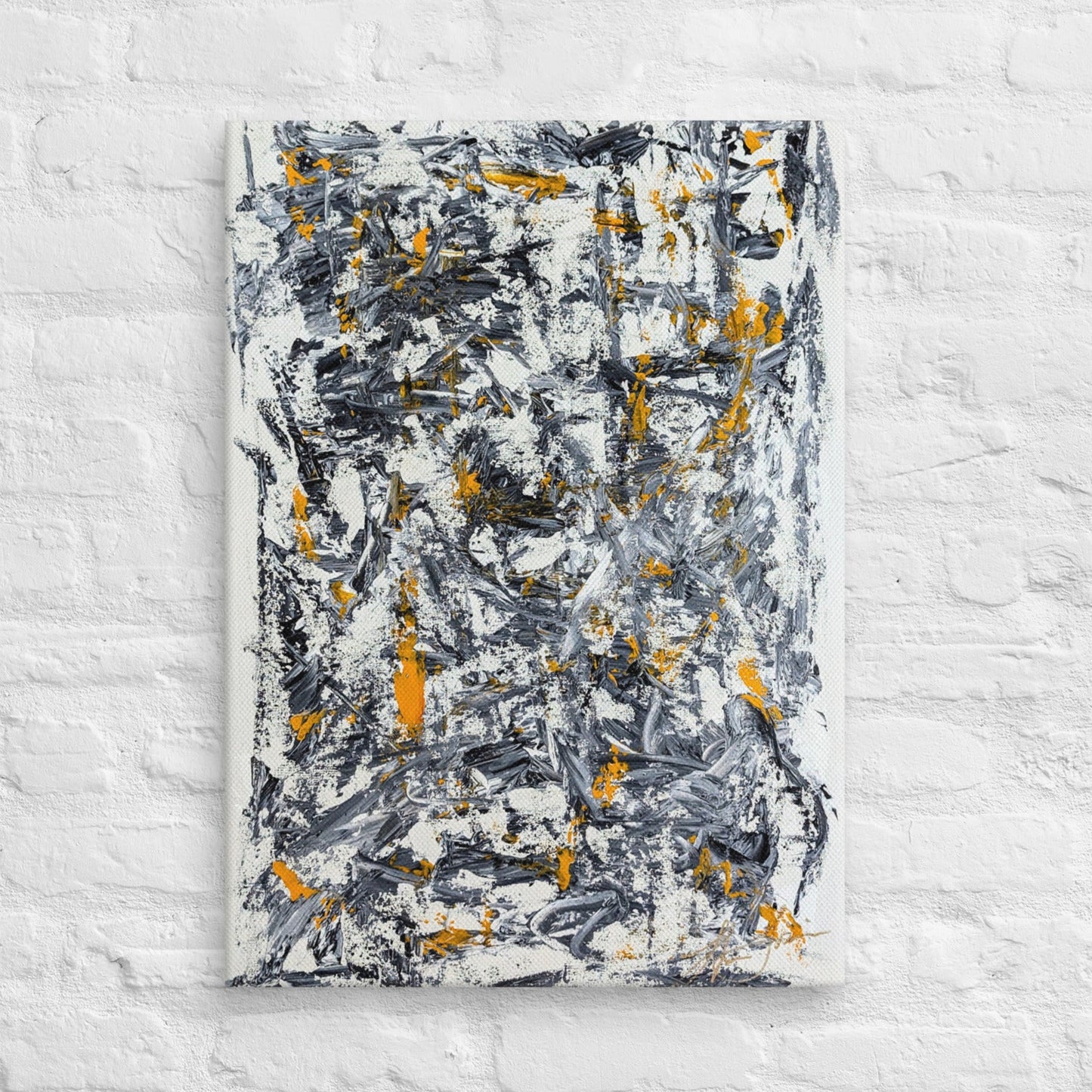 Abstract painting with black, yellow, and white on a textured white wall