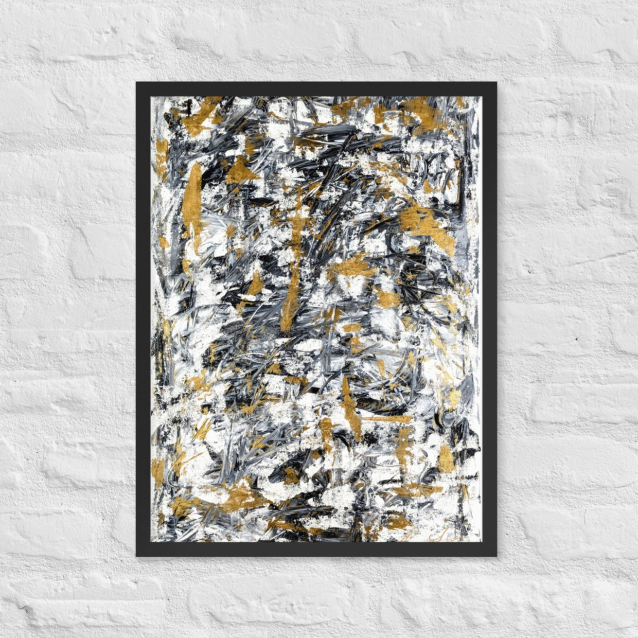 Abstract painting with black, gold, and white on a textured white wall