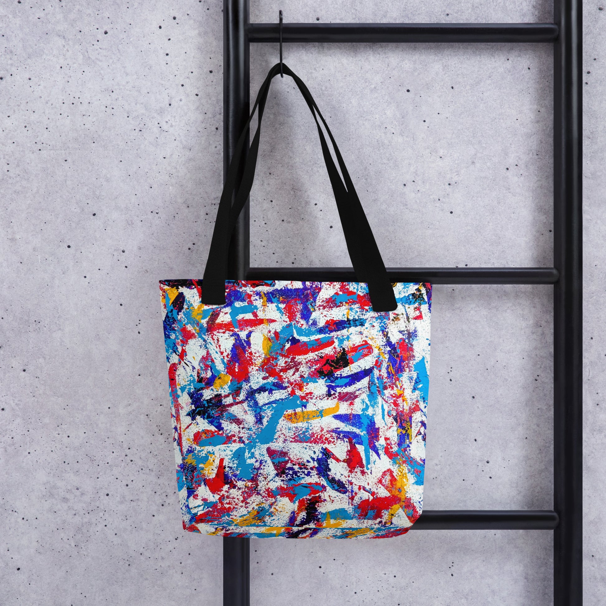 abstract art printed on a canvas tote bag, shown hanging from a step ladder with grey backdrop for a modern, artistic look
